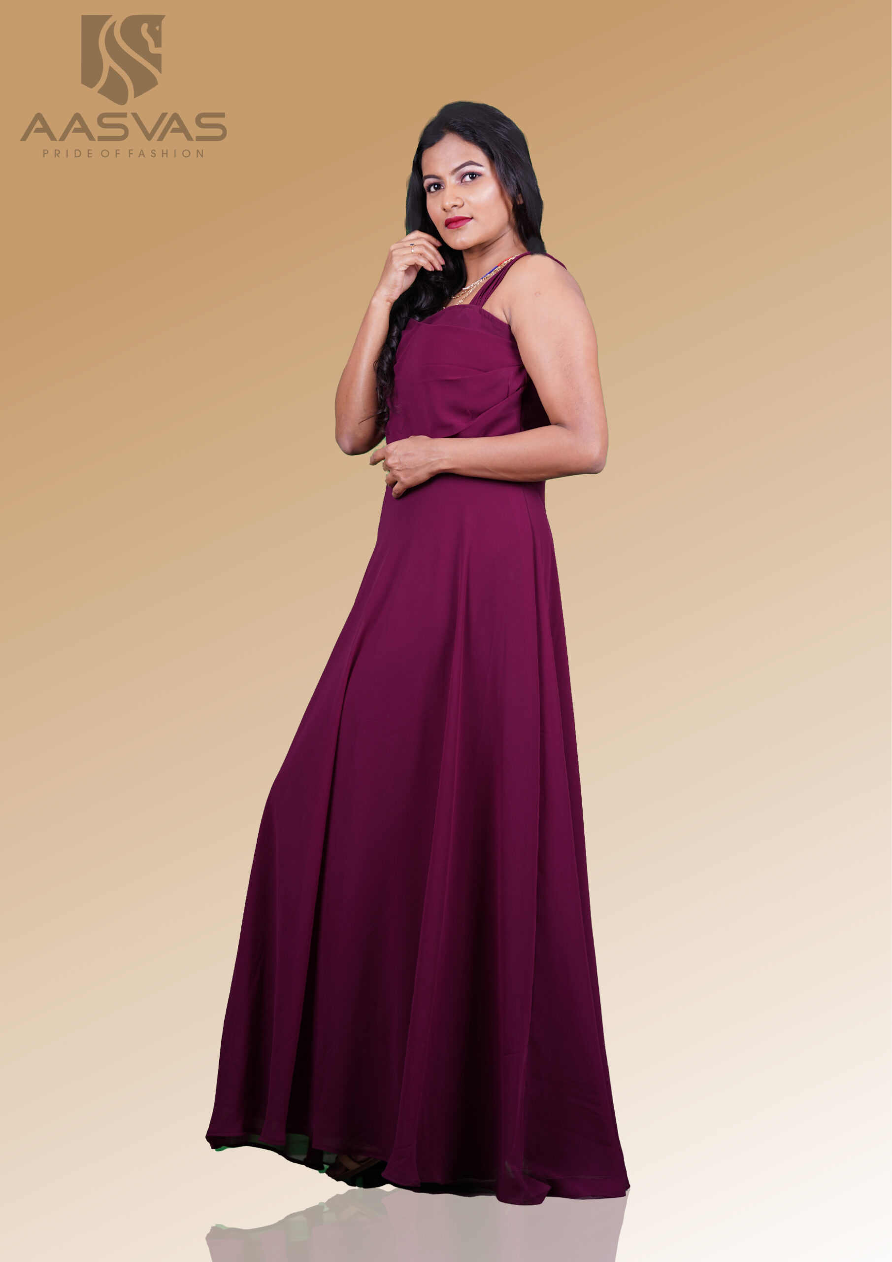 A Sleeveless Gown with a Addon Cowl Design To The Yoke