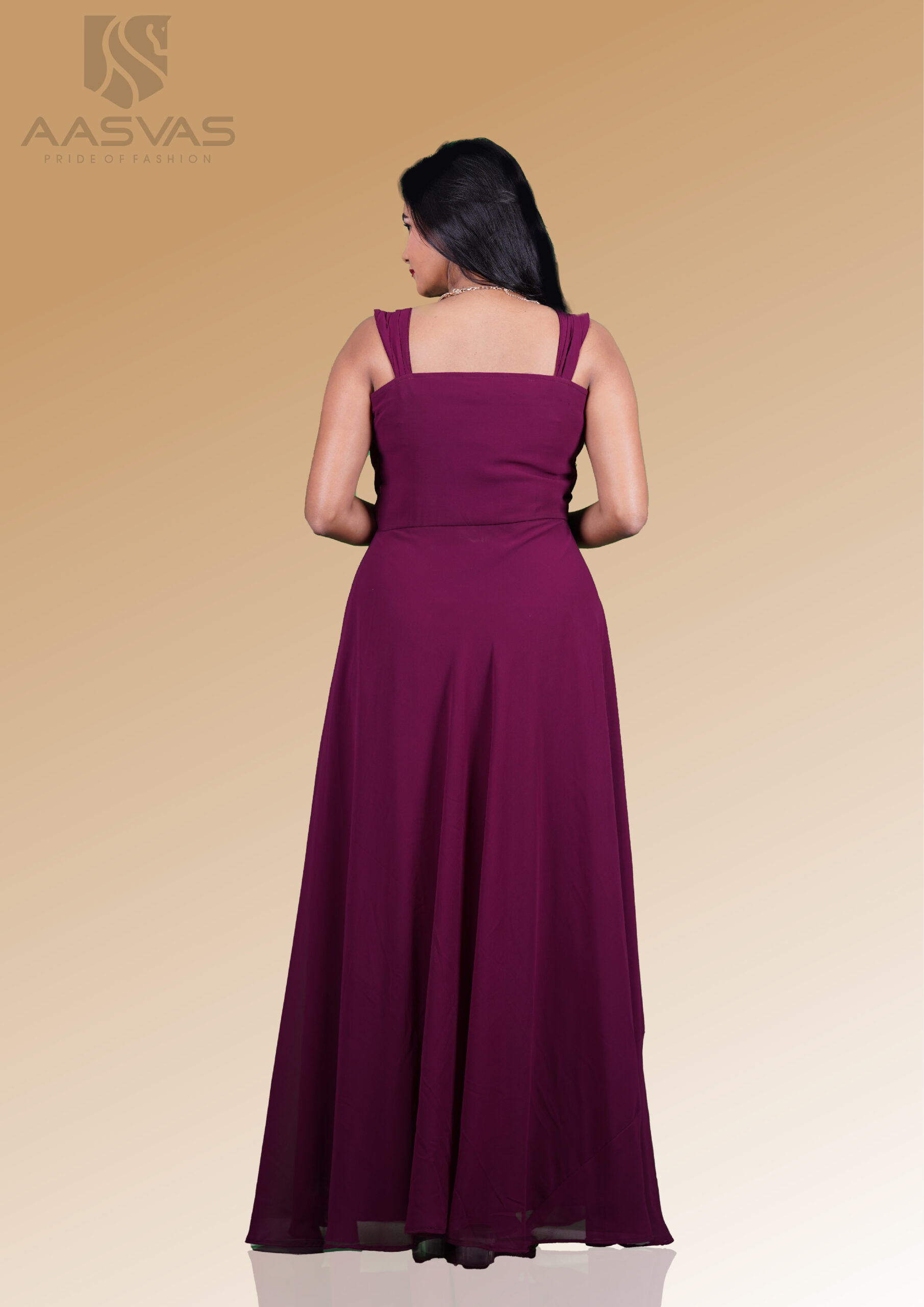 A Sleeveless Gown with a Addon Cowl Design To The Yoke